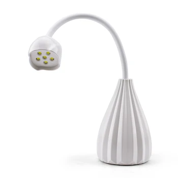 Lotus Mini tırnak lambası kurutma makinesi 12w Şarj edilebilir Taşınabilir UV / LED tırnak lambası ışık kür Lehçe tutkal taşınabilir tırnak Sanat Lambası